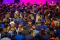 People attend business conference in congress hall