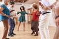 People Attending Dance Class In Community Center Royalty Free Stock Photo
