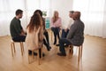 People Attending Support Group Meeting For Mental Health Or Dependency Issues In Community Space Royalty Free Stock Photo