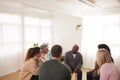 People Attending Support Group Meeting For Mental Health Or Dependency Issues In Community Space Royalty Free Stock Photo