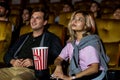 People audience watching movie in cinema theater. Royalty Free Stock Photo