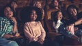 People audience watching movie in cinema theater. Royalty Free Stock Photo