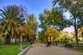 People in autumn park in Madrid