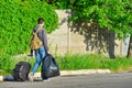 People with bags go to the station to move to another place to work after the holidays