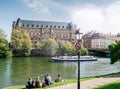 People on the bank of Ill river having a picnic