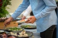 People at a banquet taking different food. Colleagues Buffet Par Royalty Free Stock Photo