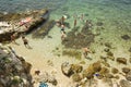 People bathing on beach in Rovinj