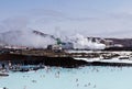 People bathing in the Blue Lagoon geothermal bath resort, Iceland