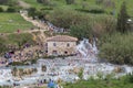 People bathing in natural spa of the hot Mill waterfalls of cascate dele Mulino. Grosseto, Tuscany, Royalty Free Stock Photo