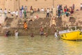 People bathing in the river Ganges at the Raja Ghat in Varanasi