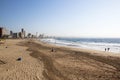 People on Beach Against City Skyline in Durban Royalty Free Stock Photo