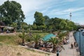 People at beach bar and Monbijoupark next to river Spree in Berlin Mitte Royalty Free Stock Photo