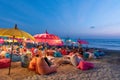 People at the beach drinking at a kuta beach bar Royalty Free Stock Photo