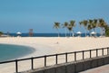 People on the beach near Sharjah city in United Arab Emirates Royalty Free Stock Photo