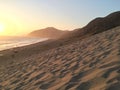 People on the beach at sunset in southern California Royalty Free Stock Photo