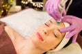 Woman having microdermabrasion facial treatment Royalty Free Stock Photo