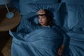 sleepless asian woman lying in bed at night Royalty Free Stock Photo