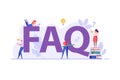 People with big FAQ sign. Customers asking frequently asked questions. Concept of customer guide, useful information, online Royalty Free Stock Photo