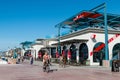 People Bike and Walk Along Mission Beach Boardwalk in San Diego Royalty Free Stock Photo