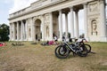 People with bikes in front of Colonnade Reistna classicist gloriette in Lednice Valtice cultural landscape area, UNESCO heritage