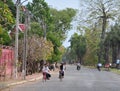 People biking on street in Kep, Cambodia