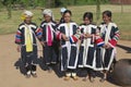 People of the Black Lahu hill tribe perform traditional dance wearing traditional tribal dresses in Mae Hong, Thailand.