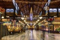 People blured in motion shopping in the Great Market Hall in Budapest