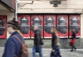 People in blurry motion passes in front of Moscow Operetta / Opera building. Royalty Free Stock Photo