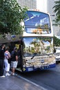 People board the famous Deuce public transit bus
