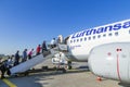 People board a Lufthansa aircraft