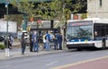 People board public bus wearing masks during COVID-19 pandemic Bronx NY