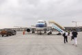 People boarding airplane at Shanghai Pudong International Airport Royalty Free Stock Photo