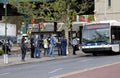 People boarding bus while wearing masks in Bronx NY