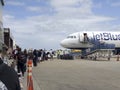 People boarding plane via external ramp