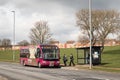 People boarding a public transport bus