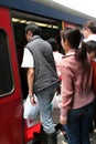 People boarding a train