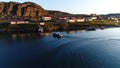 People in boat aerial view Stts Dalniye Zelentsy in Barents Sea.