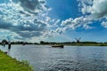 People on boat on dutch river