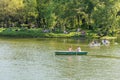 People Boat Ride On Carol Public Park Lake On Spring Day