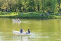 People Boat Ride On Carol Public Park Lake On Spring Day