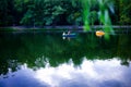 People Boat Ride On Public Park Lake In Summer.