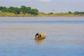 People in a boat on the river Irrawaddy, Bagan, Myanmar, Burma. Copy space for text.