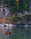 People boating at water of the Lago di Braise in the dolomite of the Italian alps in Italy