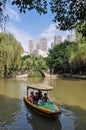 People Boating in Wetland Park