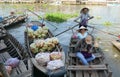 People on the boats at floating market in Mekong Delta, Vietnam