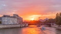 People and boats timelapse, Le Pont D'Arcole bridge at sunset, Paris, France, Europe