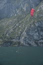 People in boats and on the water practicing sailing and sailing sports. Lake Garda