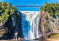 People at Bottom of Montmorency Falls Royalty Free Stock Photo