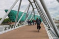 People on the bridge to the Nemo museum in Amsterdam Royalty Free Stock Photo