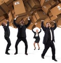 People buried by a stack of cardboard boxes. Concept of internet shopping addiction Royalty Free Stock Photo